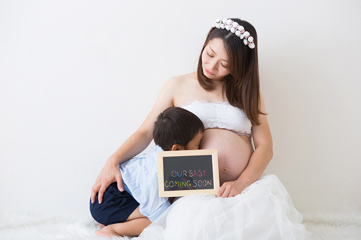 誕生する赤ちゃんへのメッセージを写真に添えて